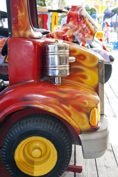 Detail of a toy lorry in the amusement park