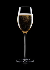 Elegant glass of yellow champagne with bubbles