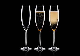 Elegant glasses of yellow champagne with bubbles
