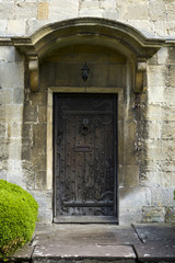 An ancient studded wood entrance door