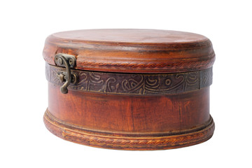 A vintage wooden dusty jewelery box on a white background, isolated