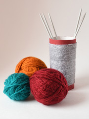 yarn and glass on a white background