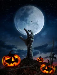 Rolgordijnen Zombie hands rising in dark Halloween night. © chaiyapruek