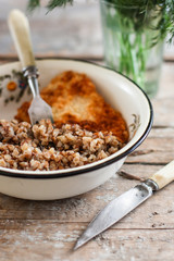 buckwheat porridge and a piece of meat