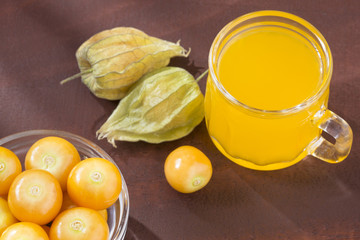 Naklejka na ściany i meble Uchuva fruit and juice - Physalis peruviana