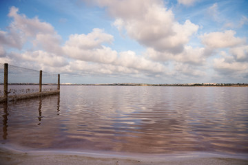 Pink lake in  Torrevieja, Spain. The water looks pink due to a special algae that grows in high levels of salt.