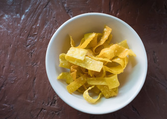Crispy fried wonton on the wood table