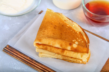 Traditional Ukrainian or Russian pancakes. Shrovetide Maslenitsa. Traditional dishes on the holiday Carnival Maslenitsa Shrovetide.