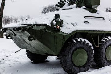 The snow is armor reconnaissance vehicle black and white