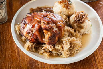 Pork knuckle with fried sauerkraut