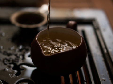 Green Tea Pouring in Traditional Chinese Tea Ceremony
