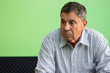 Obraz premium Elderly man lost in thought 