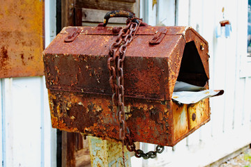 Rusted Mailbox with Chain