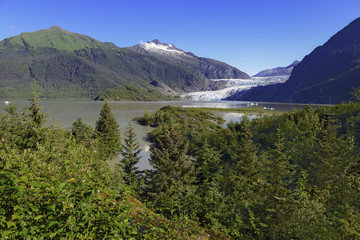 Fototapeta na wymiar Wilderness landscape of mountains and sea in the Tongass National Forest, near Juneau Alaska, USA