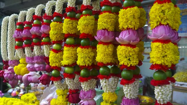 flower garlands for sale opposite sri maha mariamman temple on silom road in bangkok, thailand
