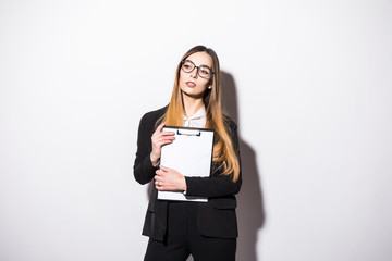 Young pretty business woman with tablet paper isolated on white background