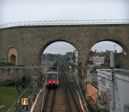 Paris, France-January 21, 2018: The aqueduct between the towns Arcueil and Cachan on the South of Paris, built under Henry IV.
