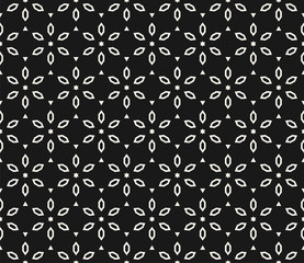 Vector geometric floral pattern. Ornamental seamless texture in traditional ethnic style. Abstract monochrome background with linear flower shapes in regular grid. Elegant black and white design