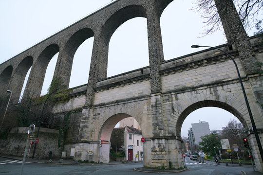 Paris, France-January 21, 2018: The aquaduct between the towns Arcueil and Cachan on the South of Paris, built under Henry IV.