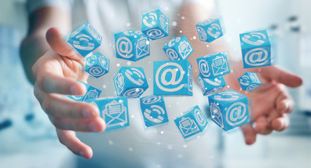 Businessman using floating cube contact 3D rendering