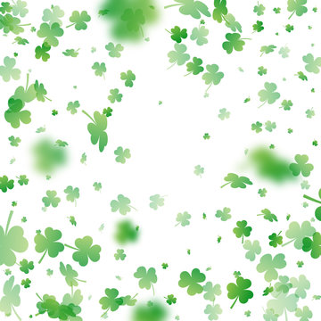 St. Patrick's Day background. Clover leaves with blur effect for greeting holiday design. Vector illustration.