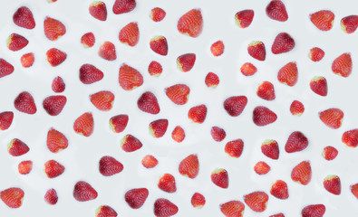 Texture of strawberry in milk. Strawberry islands in the milk ocean.
