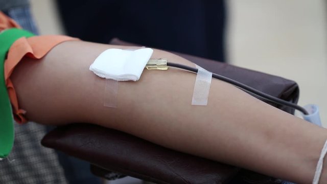 Health and Medical concept. Taking blood on finger for analysis test in clinical. Blood test is laboratory analysis performed on sample that usually extracted from vein in arm using hypodermic needle.