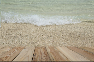 Fototapeta na wymiar Beautiful beach background with wooden space.