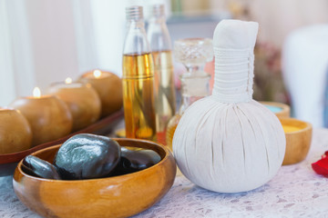 Rolled, compress balls, bottle oil, salt, towels, bowl and gel. Treatment therapy spa thai and cleaning body. concept of beauty salon spa.