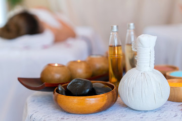 Rolled, compress balls, bottle oil, salt, towels, bowl and gel. Treatment therapy spa thai and cleaning body. concept of beauty salon spa.