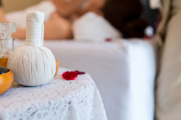 Rolled, compress balls, bottle oil, salt, towels, bowl and gel. Treatment therapy spa thai and cleaning body. concept of beauty salon spa.
