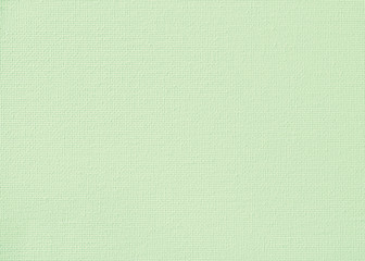 Canvas burlap fabric texture background for painting in lime green pastel color.
