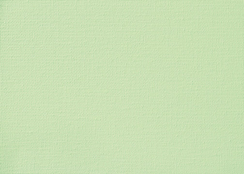 Canvas burlap fabric texture background for painting in lime green pastel color.
