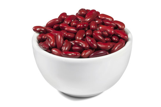 Red beans in a white plate on a white background