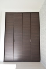 Inside the house, storage of the room, a folding door type closet door