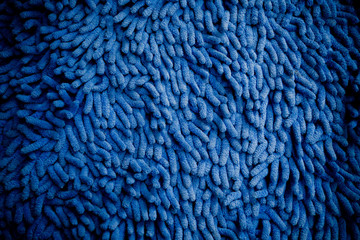 blue carpet.  blue fabric texture background. closeup