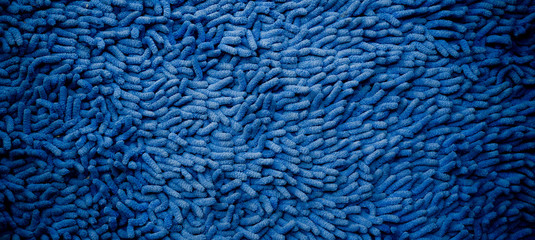 blue carpet.  blue fabric texture background. closeup