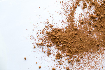 pile cocoa powder isolated on white background