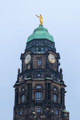 Fototapeta na wymiar Old churh tower with clock in Dresden, Saxony, Germany