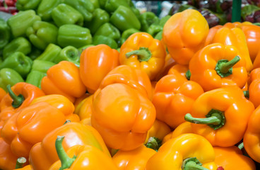 Green and orange pepper on the market 
