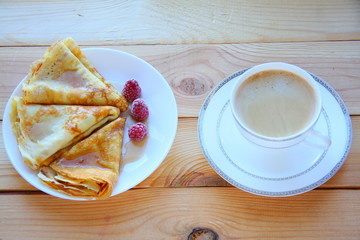 Fried pancakes with hot coffee