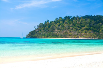 Fototapeta na wymiar Island and sea beach with clear blue water
