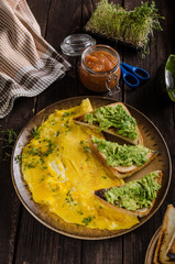 Egg omelette with garlic avocado toast
