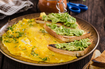Egg omelette with garlic avocado toast