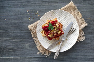 Toast with boiled beets, nuts and fresh parsley