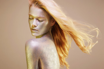 Portrait of Beautiful Woman with Sparkles