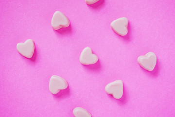 Fototapeta premium valentine candy hearts shape on pink background