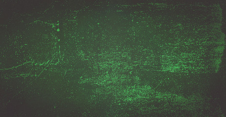 Dark green background of school blackboard colored vignetted texture. Dark green black shabby texture.