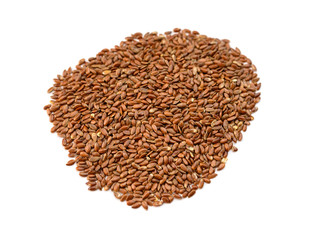 Closeup flax seeds on white background. Selective focus.