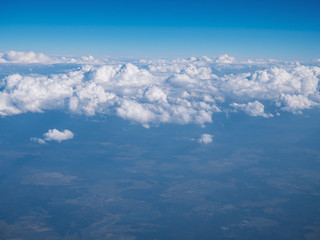 View from airplane at clouds.